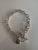 Mid 20th Century Chunky Sterling Silver Link Bracelet Featuring a Classic Tibetan Toggle Clasp and a Square Heart-Accented Charm For Sale - Image 5 of 6