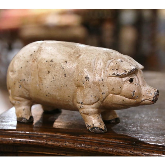 Decorate a kitchen counter with this vintage iron pig sculpture. Crafted in France, circa 1960, the hand painted pig is...