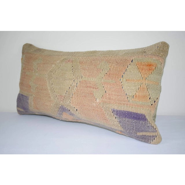 This handwoven kilim pillow is made from Anatolia and Middleast Kilim fragments. Each of our kilim pillow cover is cut...