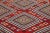 Beautiful Vintage Kilim hand-knotted wool rug with a red field. This piece has multicolor accents in an all-over geometric...