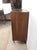 This mid century modern highboy dresser features hardwood construction, durable formica top with faux woodgrain, original...