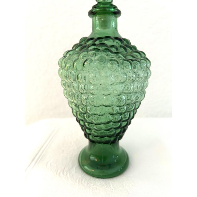 1970s green, transparent bubble glass decanter in the style of Italian Empoli with twist off plastic lined stopper....