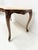 Louis xv style coffee table in stained beechwood four cabriole legs the apron is carved with flowers on all four sides...