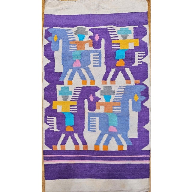 34” x 59” Vintage American Southwestern Pictorial Kilim area rug circa the late 20th century. The kilim has a pictorial...