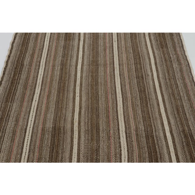 This vintage 4x7 Persian kilim is a mid-century Palas Bidjar tribal rug, handwoven in wool circa 1950-1960. On the Design:...