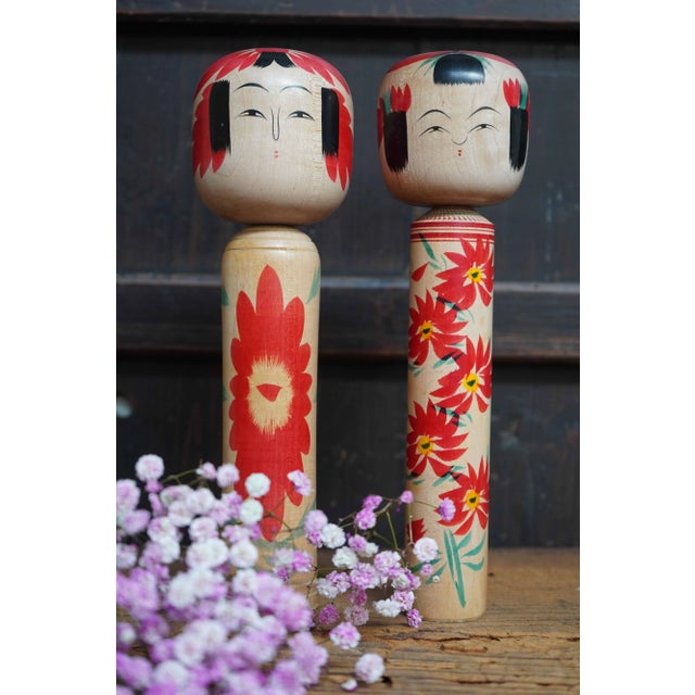 Beautiful and colorful set of traditional Kokeshi dolls. These old traditional Kokeshi are perfect for creating a unique...
