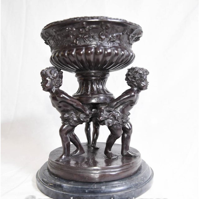 Gorgeous French bronze cherub urn - Three cherubs support the central classical urn - Bought from a dealer on Marche Biron...