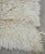 Natural fibers complete this wool Flokati rug from the midcentury era. These handmade rugs were produced for daily use by...