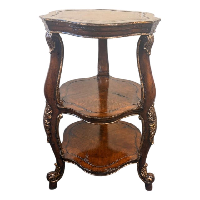 Vintage Three-Tier Accent Table With Carved Details and Gilt Accents For Sale
