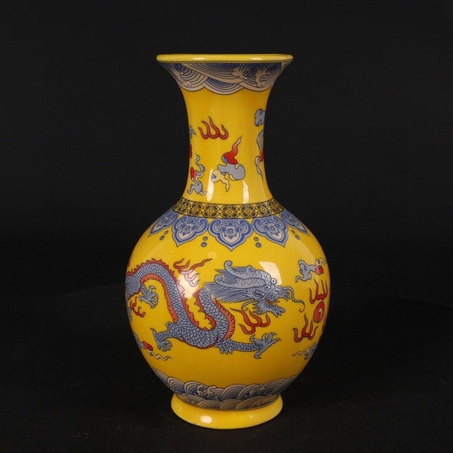 This is a stunning vintage Chinese porcelain miniature vase, decorated in the vibrant "Imperial Yellow" ground color...