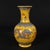 This is a stunning vintage Chinese porcelain miniature vase, decorated in the vibrant "Imperial Yellow" ground color...