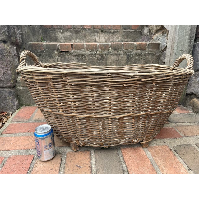 Offering an Antique Country Farm Laundry Basket. This great old basket is hand woven of Wicker Rattan with twisted Handles...