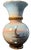 This exquisite 9-inch tall porcelain vase, hand-painted and masterfully crafted by Italian artisans, captures a dual...