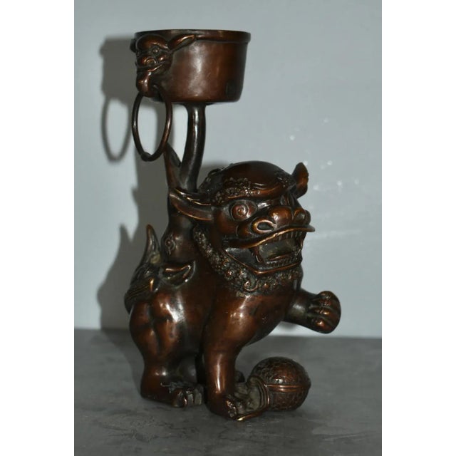 Vintage (1950's) Chinese Foo Dog Candle Holder. Made of Bronze. The Measurements: 5"W x 3"D x 8.5"H. Flat Rate Shipping $25