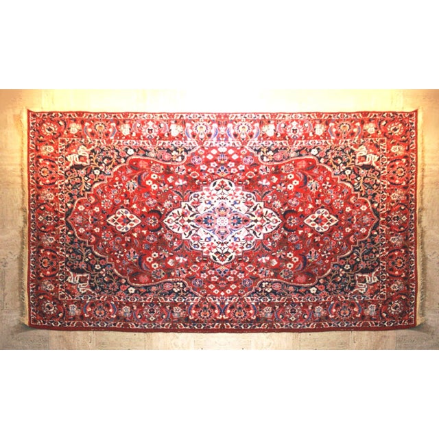 Generously sized keshan rug, made in the keshan region, in Iran, in high quality pure wool and composed of a central...