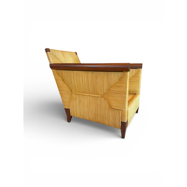 Exceptional lounge chair from the highly regarded Merbau Collection designed by John Hutton for Donghia, USA, circa 1995....