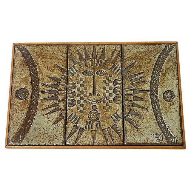 French Wall hanging tile tableau by Roger Capron, 1960s A wall hanging tile tableau with three small tiles in brown with a...