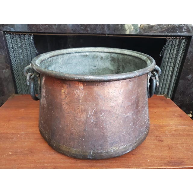 This large antique late 19th-century cauldron is a stunning piece of vintage cookware, perfect for any collector or...