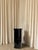 Rl 08 cylindrical pedestal in licorice glossy varnished aluminum by caspal dimensions: ø 28 x h 66 cm. Materials:...