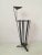 This wonderful European umbrella stand features a black metal base and a handle finished with Teak detail. It's style...