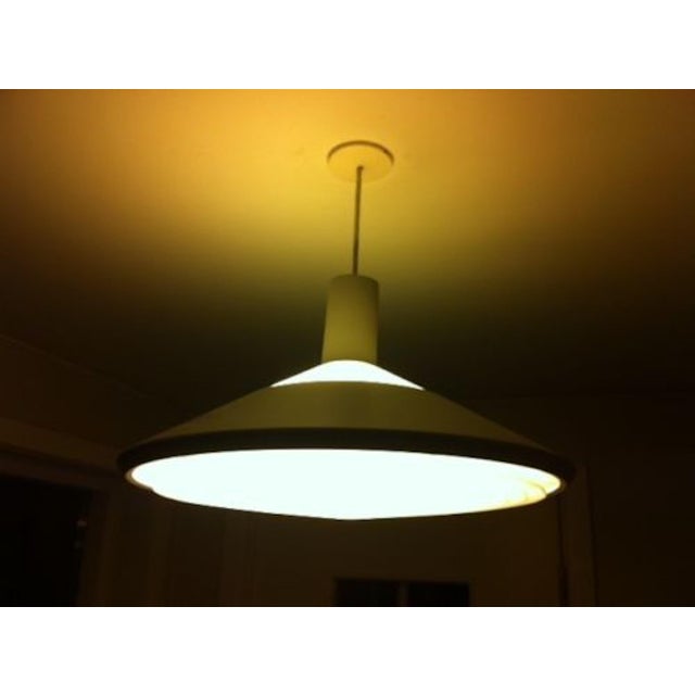 Designed in-house by Louis Poulsen in Denmark in 1967. It is called Class Room Pendant Light (Da: Klassependel) and it...