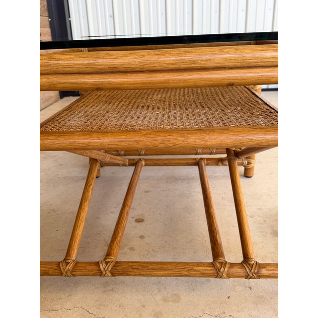 Pair of Vintage McGuire Organic Modern Rattan Side Tables With Cane Shelves and Glass Tops For Sale - Image 10 of 12