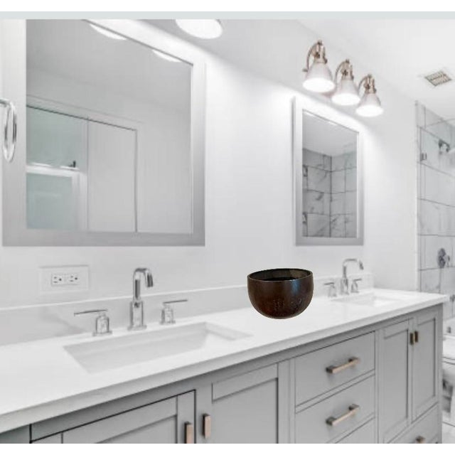 Early 19th century bronze singing bowl with a hand hammered texture to the outside. Buddhist rituals would strike the 5”...