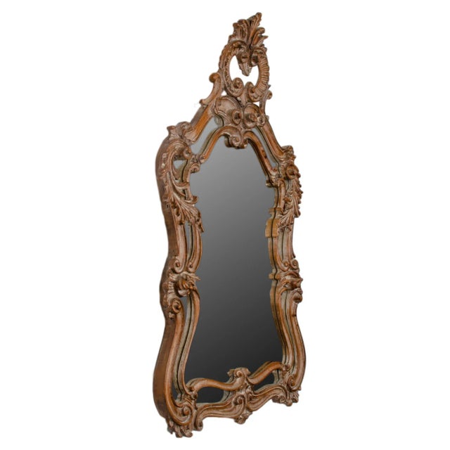 A carved wood Italian Rococo style mirror for Ethan Allen. 25 inches wide by 4 inches deep by 43 inches tall
