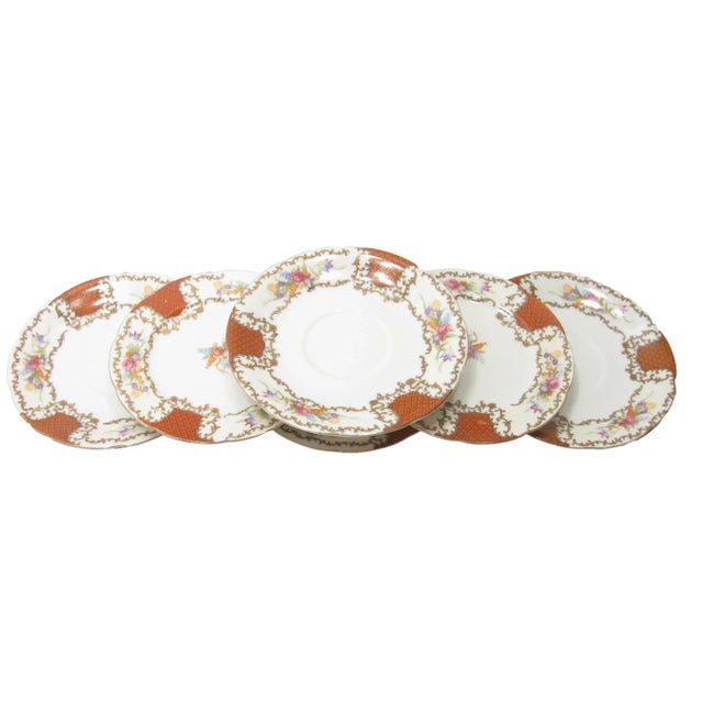 Lovely mid-century French inspired china in a gilt and floral motif. Great to mix and match with other patterns. Set...