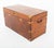 Handsome military campaign trunk crafted from aromatic camphor wood Featuring impressive brass strapwork double locks and...