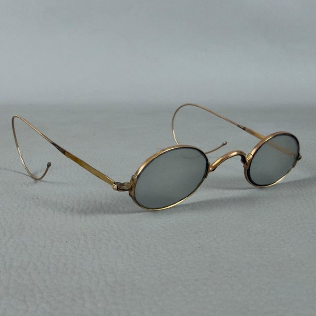 Extremely rare and exclusive pair of vintage 14-karat gold glasses, complete with their original velvet-lined hard case...
