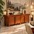 Country' sideboard by Vittorio Introini for Saporiti, an example of refined and functional design. Made of walnut veneer,...