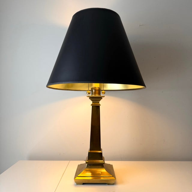 Vintage Chapman style brass two pull socket lamp paired with large vintage black and gold lined empire lamp shade.