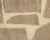 Elegant hand-knotted wool rug with a handwoven geometric pattern in Ivory on a Velvet Fawn backdrop, plush comfort with...