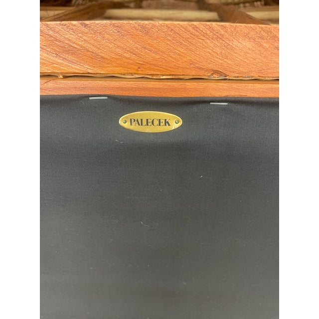 This elegant wingback lounge chair by Palecek showcases the brand’s signature craftsmanship, combining finely woven rattan...