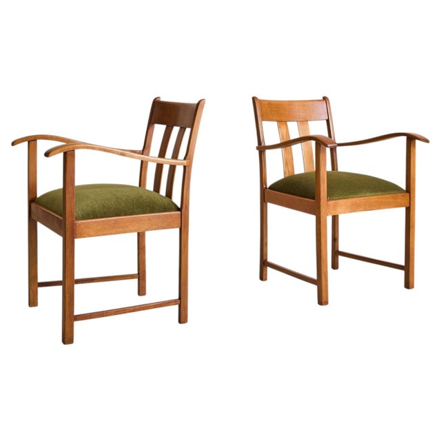 A French oak armchair from the 1950s, shaped with the kind of restraint that lets the details speak for themselves....