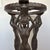 Striking and highly decorative antique cast-iron pedestal stand featuring elaborate female caryatid figures with raised...