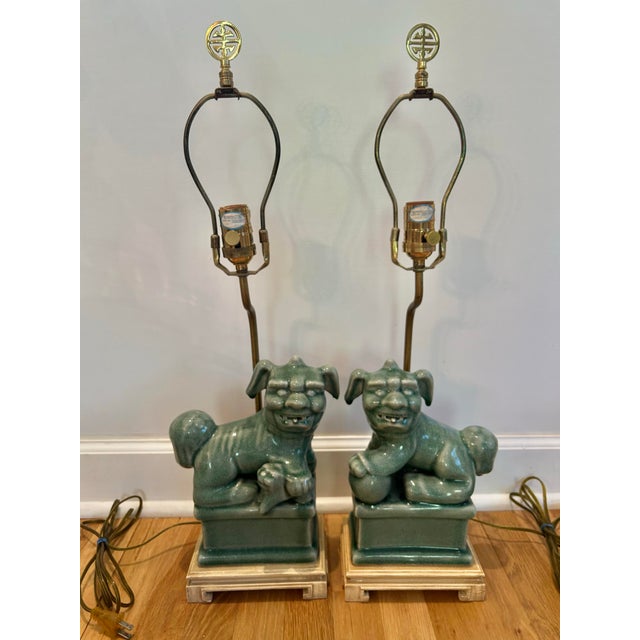 These lamps were imported by Oriental Accents in the 1970’s The foo dogs are celadon crackle glaze porcelain and rest on...