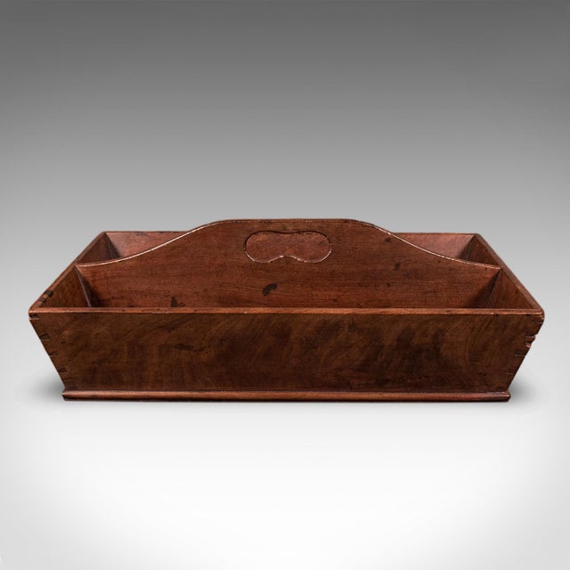 This is an antique butler's carry. An English, walnut country house silver polishing box or cutlery tray, dating to the...