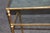 Dimensions- H: 33in W: 45 1/4in D: 14in Bring timeless French sophistication into your home with this elegant Directoire...