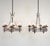 Elevate your home decor with the elegance of this pair of Mid-Century Italian Chrome and Wood Chandeliers. The...