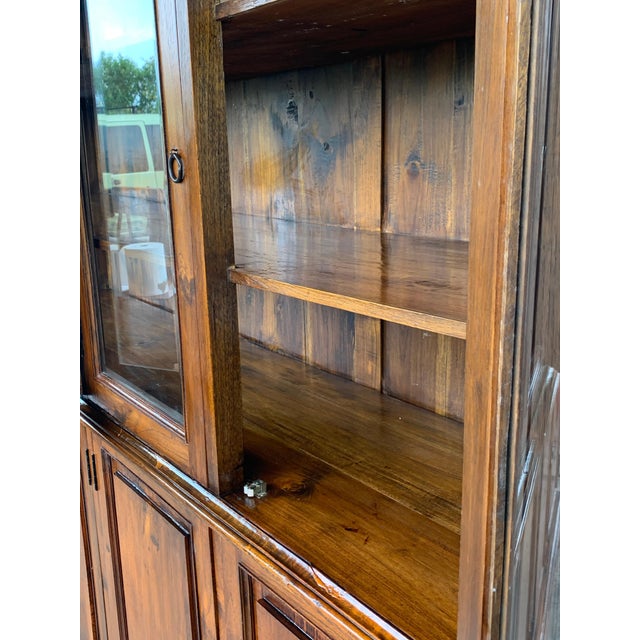 19th century Spanish cupboard or bookcase with glass vitrine, constructed from a pine called "mobila" and original glasses...