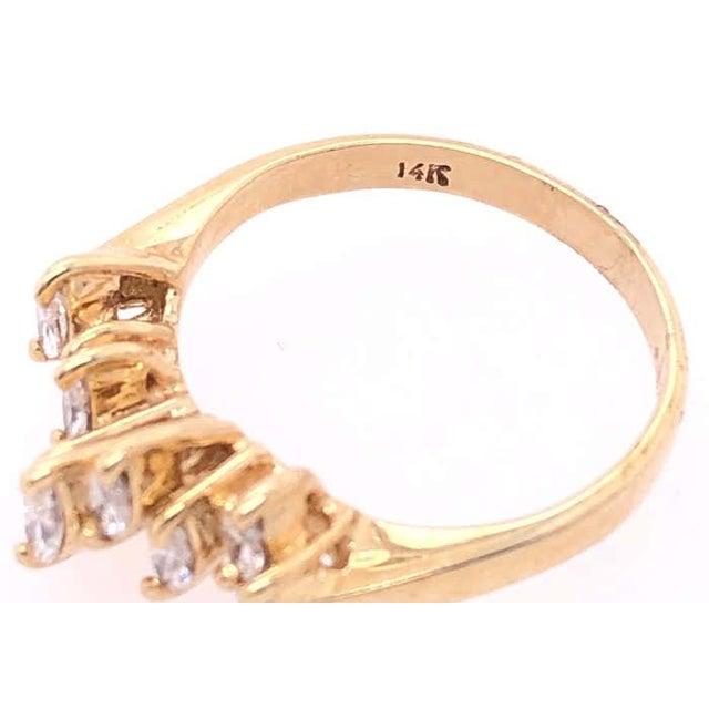 14 Karat Yellow Gold Wedding Bridal Ring with Marquise Diamonds Size 5. 1.00 total diamond weight. 3 grams total weight.
