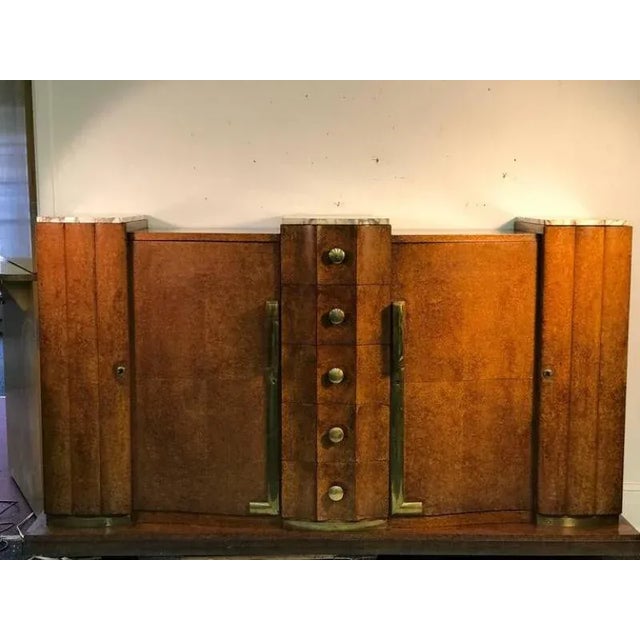 A monumental and rare Art Deco sideboard, or cabinet with marble top, and fine quality brass finishes by Jules Leleu,...
