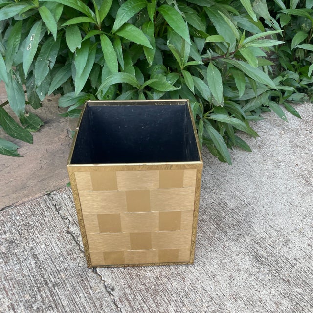 This wonderful woven brass wastebasket will add a touch of glam to any room.