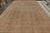 Hand knotted in wool circa 1950-1960, this vintage 10x16 Tabriz rug exemplifies Persian rugs of the period, relishing an...