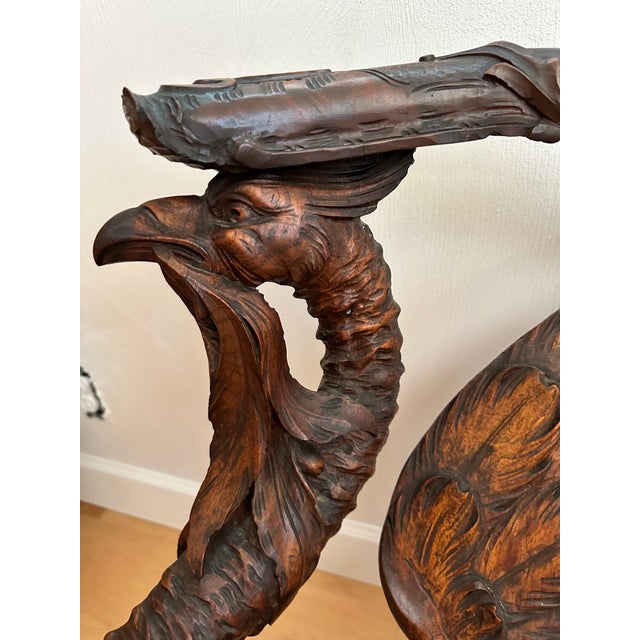 Beautiful handcarved wooden bird vanity chair. Half moon shape. Ball and claw feet very ornate and must see.