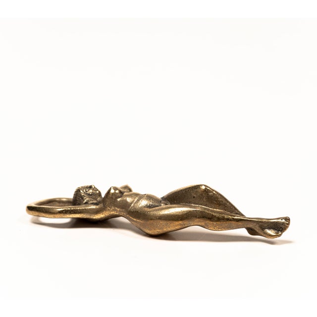 This elegant bottle opener from the 1970s combines fine craftsmanship with the playful charm of MidCentury design. Made...