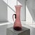 This hand-blown Blenko amethyst glass pitcher, Model #579, was designed by Wayne Husted during the 1950s. Produced in the...