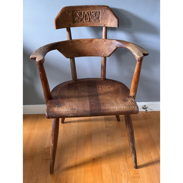 Mid-century British Oak armchair made by the Jamestown Lounge Company of Jamestown, New York. Crafted from substantial...